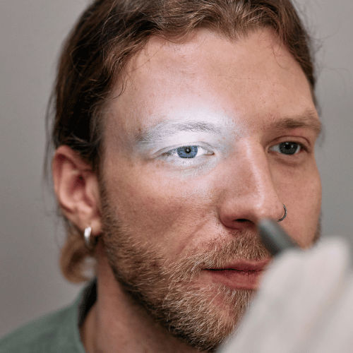 A Man having an Eye Examination