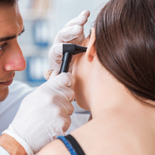 Doctor Checking Patients Ear during Medical Examination
