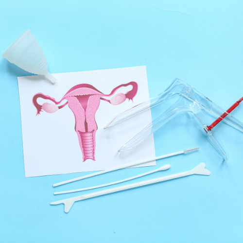 Drawing of Uterus with Gynaecological Speculum, Pap Smear Test Tools and Menstrual Cup on Blue Background