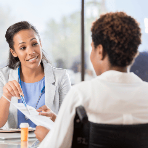 Doctor reviews test results with patient during abnormal discharge appointment