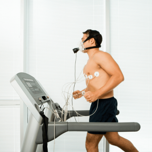 Man wearing medical testing equipment on a treadmill