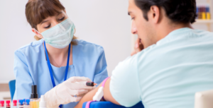 doctor taking blood